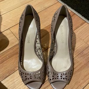 Nude Enzo Angiolini stencil-like peep toe pumps. Size 6. Worn a couple of time.